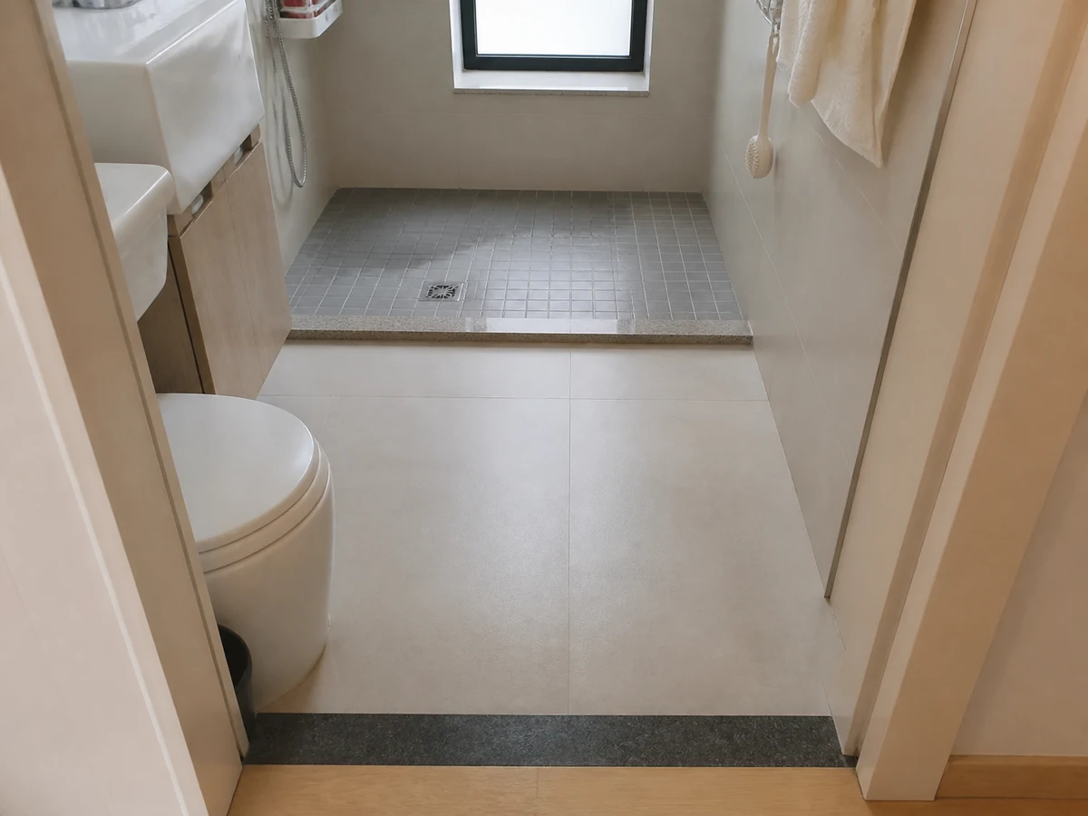How to Clean a Bathroom Floor and Reduce Slip Risk: Clean from far side to exit