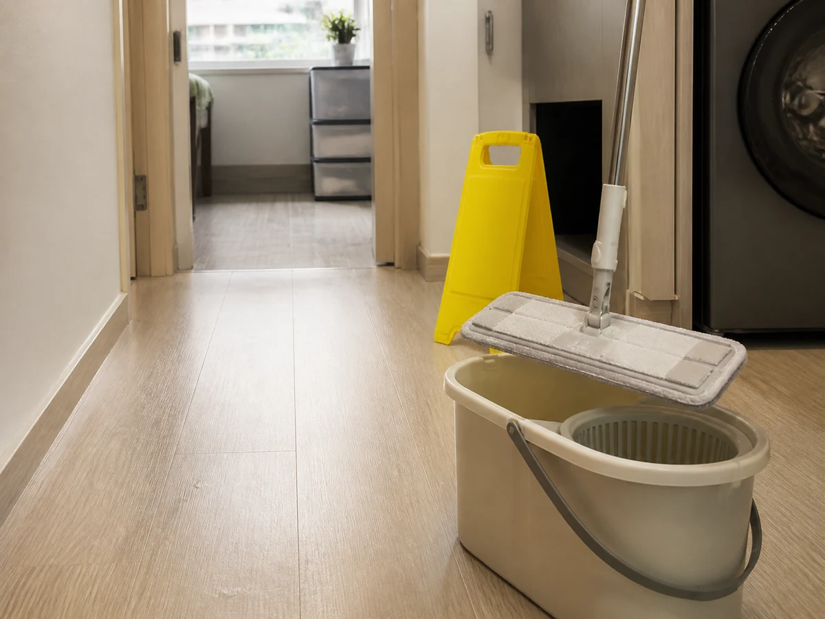 The Correct Order for Vacuuming and Mopping: Prepare to mop and mark the area