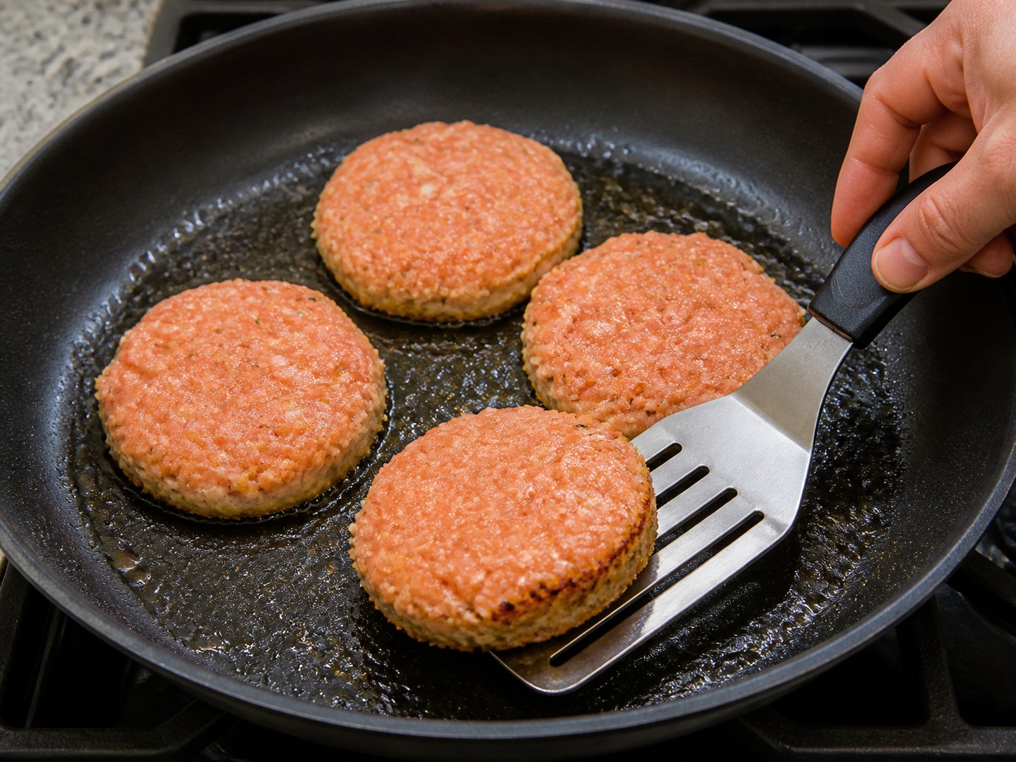 American Salmon Burgers with Cucumber Dill Sauce — Cook the first side until golden
