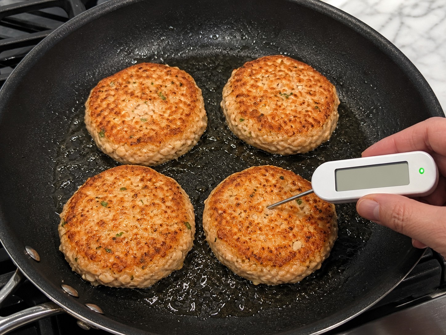 American Salmon Burgers with Cucumber Dill Sauce — Turn and cook until the centre is done