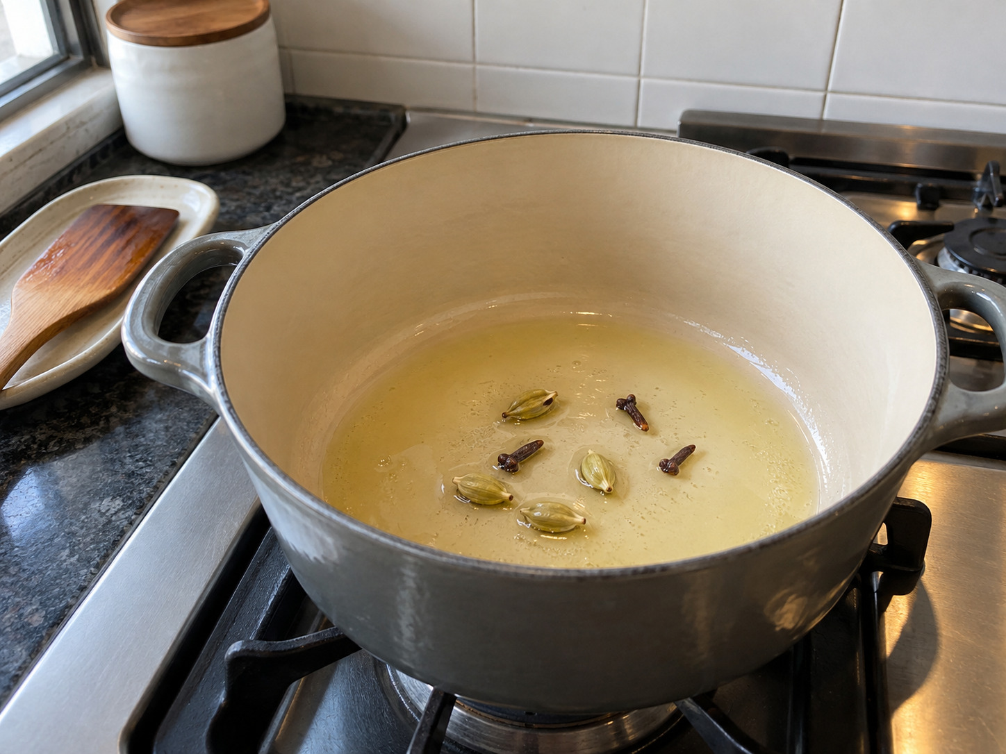 Bengali Chicken Rezala — Warm cardamom and cloves in oil