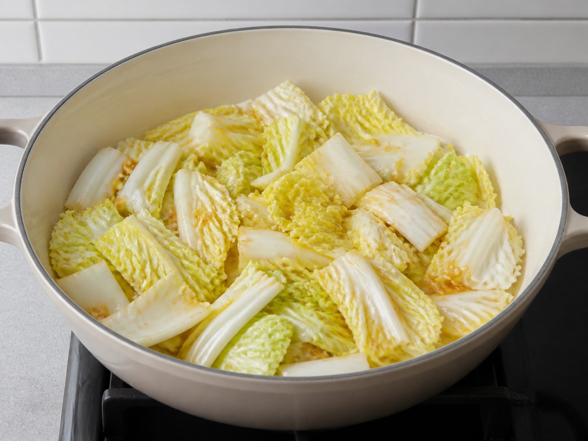 Braised Napa Cabbage with Tofu Puffs: Coat the main ingredient