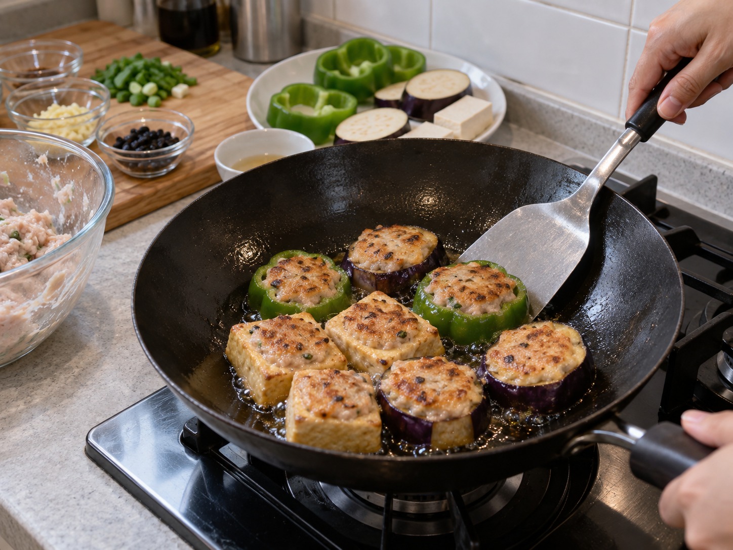Cantonese Pan-Fried Stuffed Three Treasures — Pan-fry for four minutes until the fish paste is golden and set