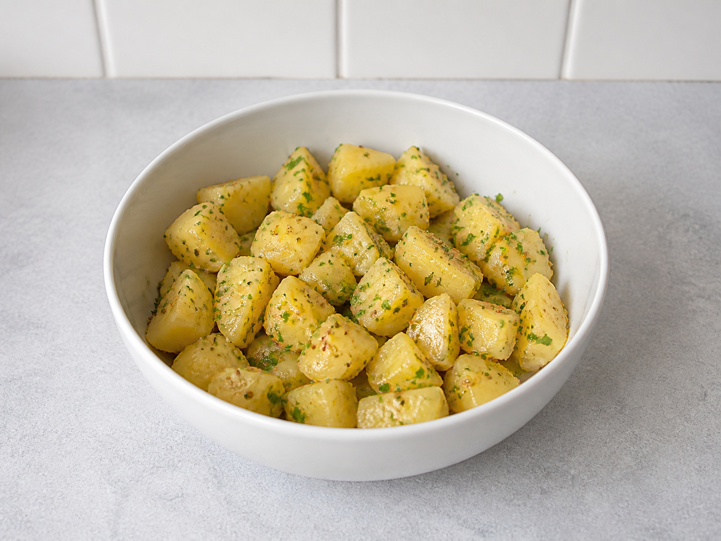 Chicken Schnitzel with Warm Potato Salad: Dress the warm potatoes