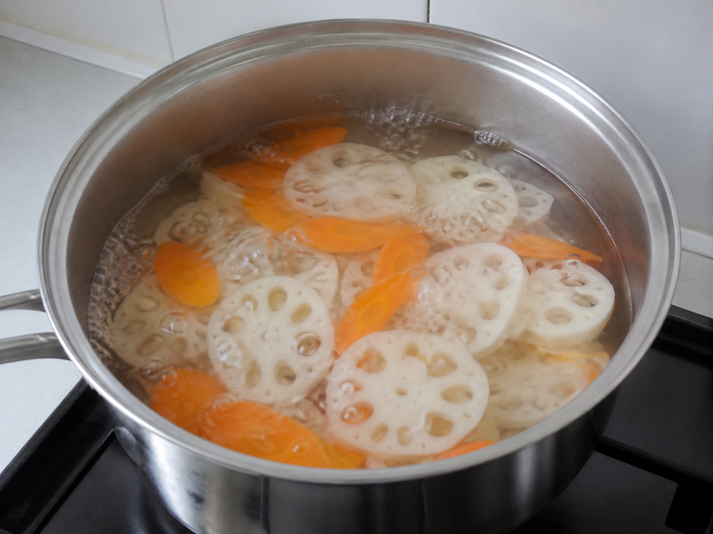 Chinese Lotus Root, Black Fungus and Snow Pea Stir-Fry — Blanch lotus root and carrot