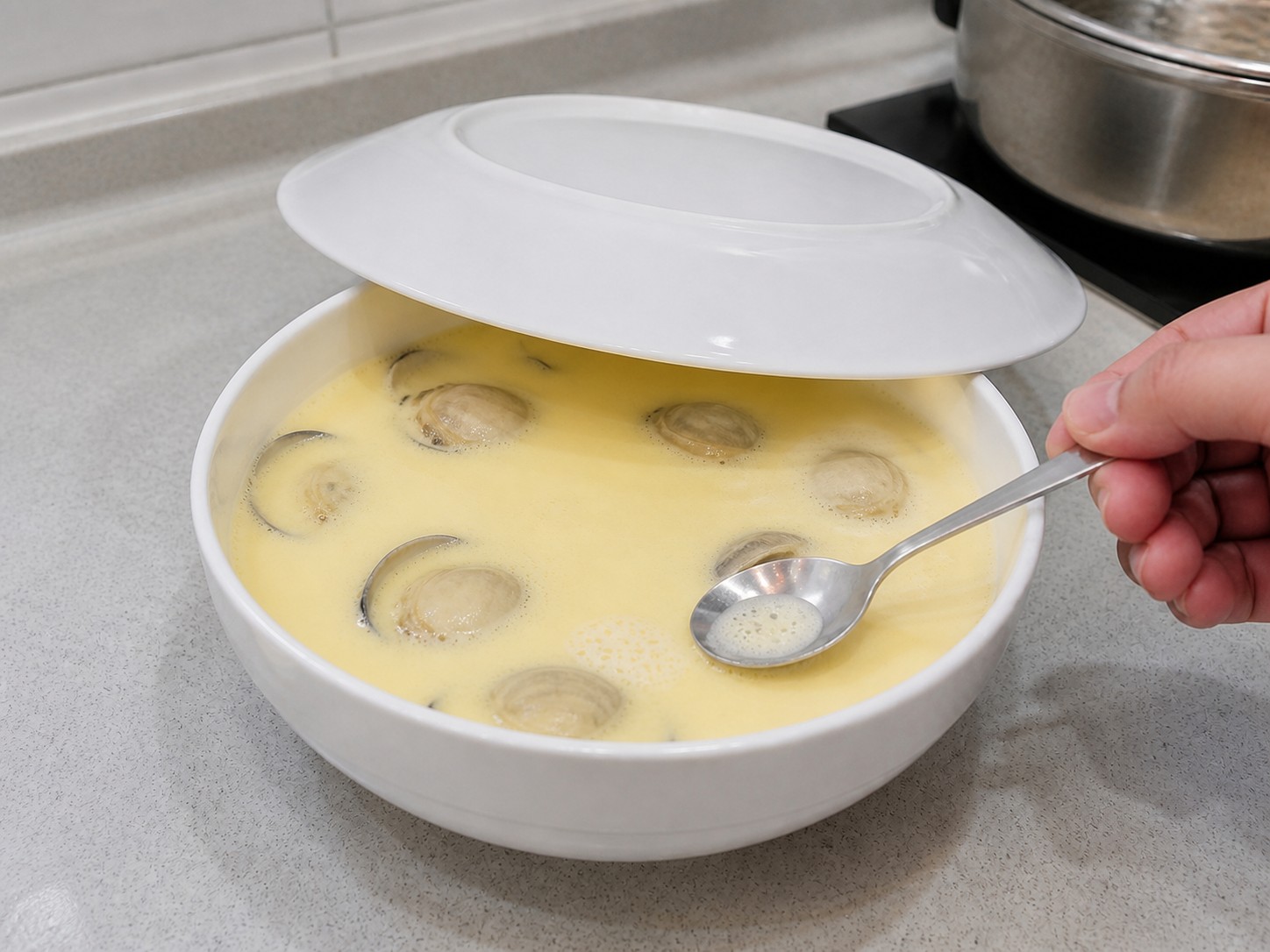 Steamed Egg Custard with Clams — step 8: Remove surface bubbles