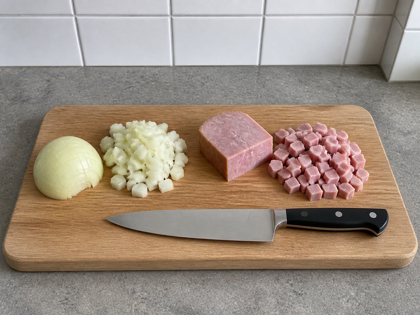 Dice onion and ham: Dice onion and ham. Use the listed ingredients and the appropriate household tool in order; confirm the food has reached the described state before continuing.