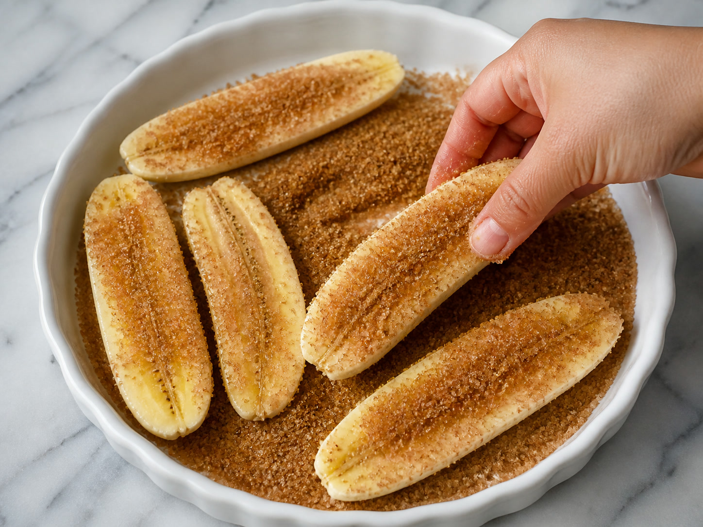 Filipino Caramelised Banana Turon: Coat with sugar