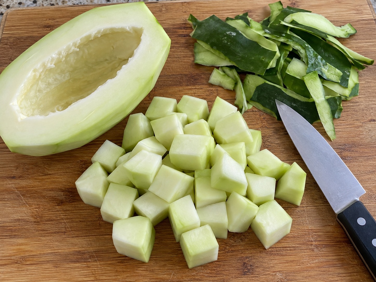 Binakol Coconut Chicken Soup — Cut green papaya