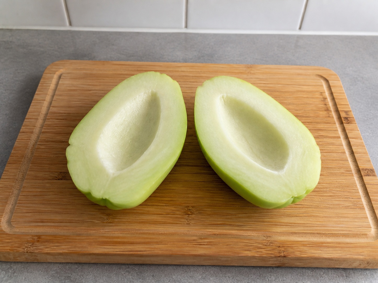 Filipino Sautéed Chayote with Shrimp — Peel and core chayote