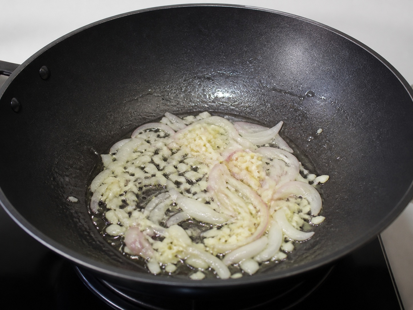 Filipino Sautéed Chayote with Shrimp — Sauté onion and garlic
