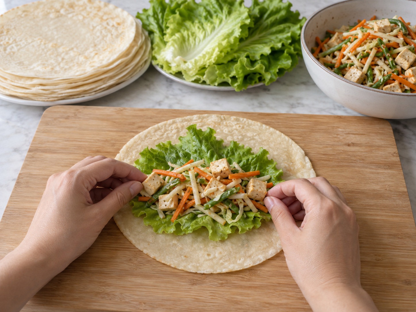 Filipino Lumpiang Sariwa Vegetable Rolls — Layer lettuce and filling