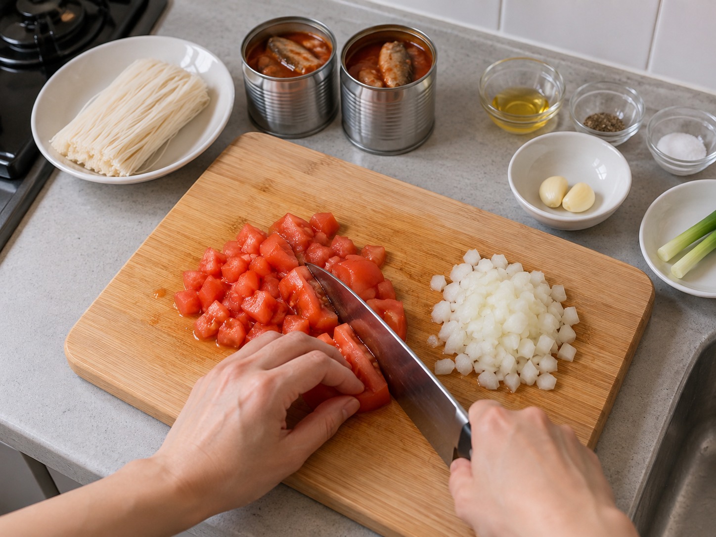 Sup Misua Sarden Saus Tomat Filipina — Cuci dan potong dadu tomat; cincang halus bawang bombai