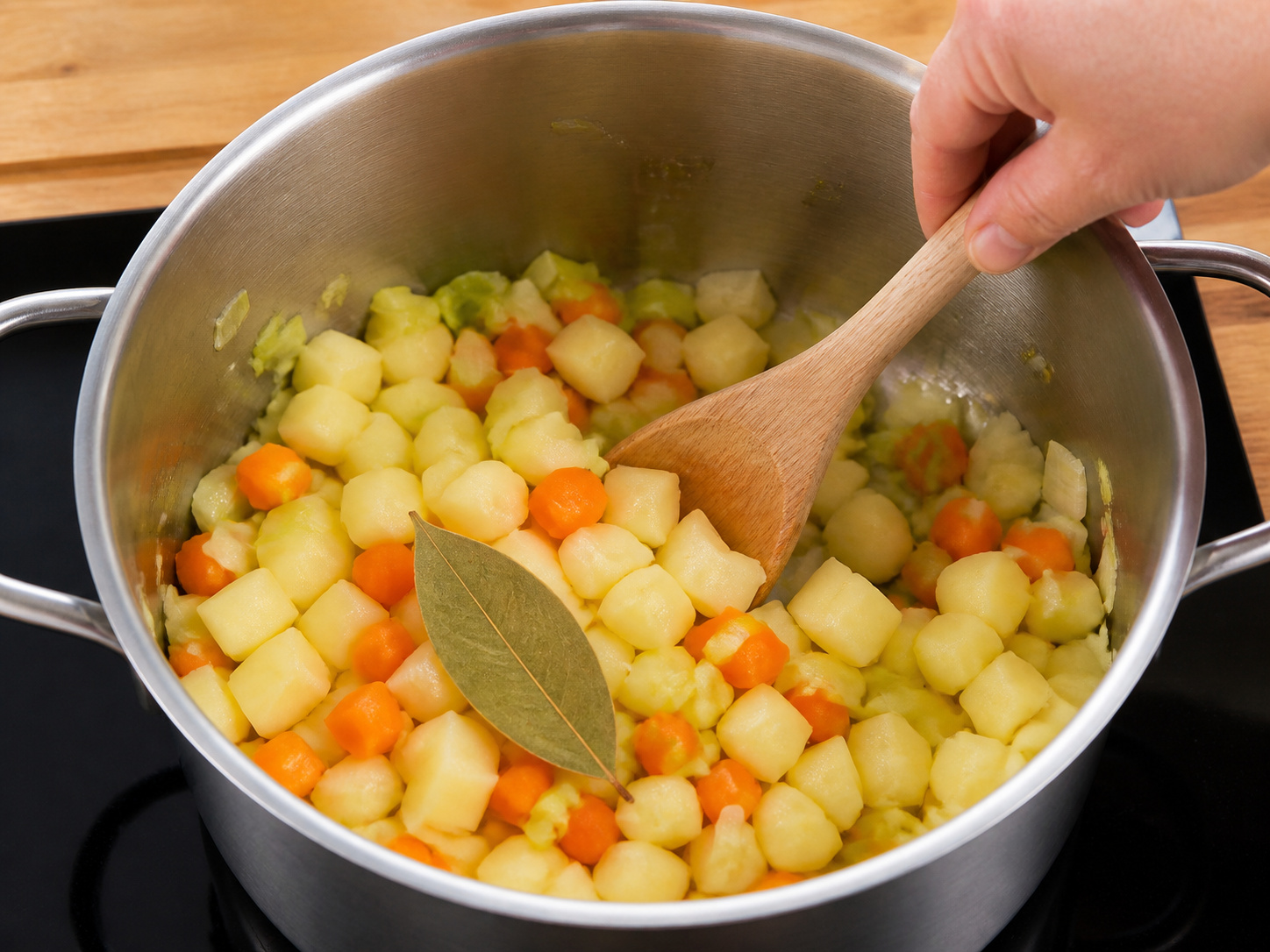 Finnish Salmon, Potato and Dill Soup — Add carrot, potatoes and bay leaf