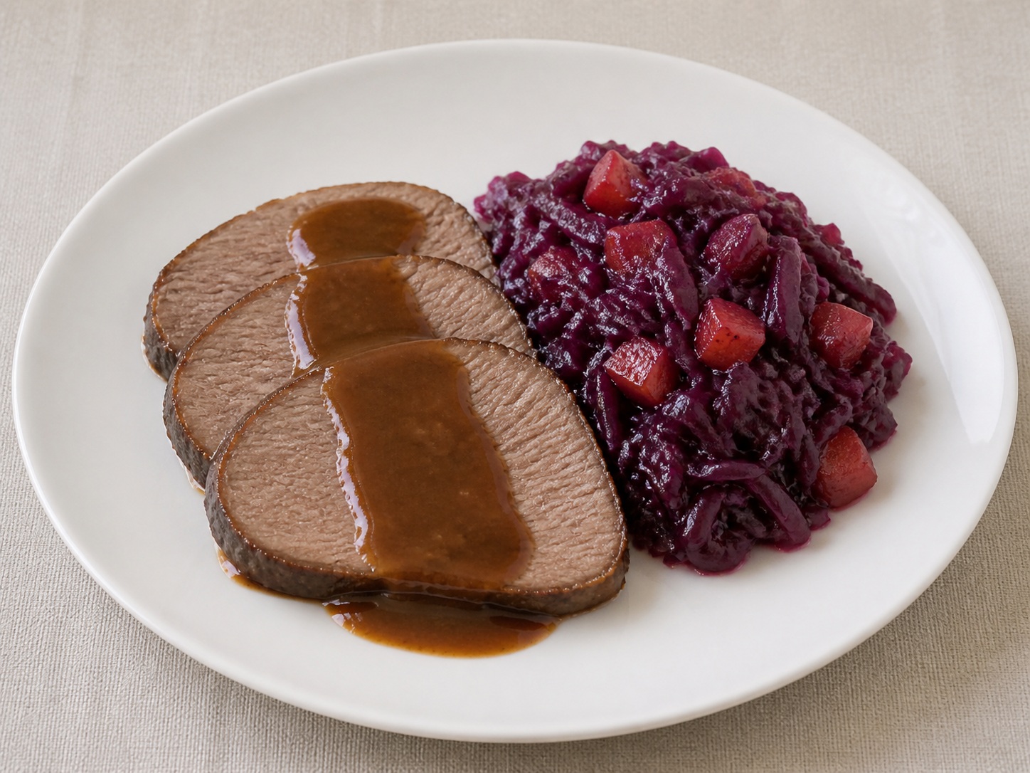 Serve beef with cabbage and gravy: Serve beef with cabbage and gravy. Use the listed ingredients and the appropriate household tool in order; confirm the food has reached the described state before continuing.