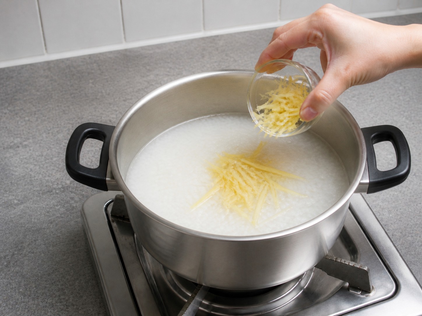 Ginger Fish Fillet Congee — step 9: Add the ginger