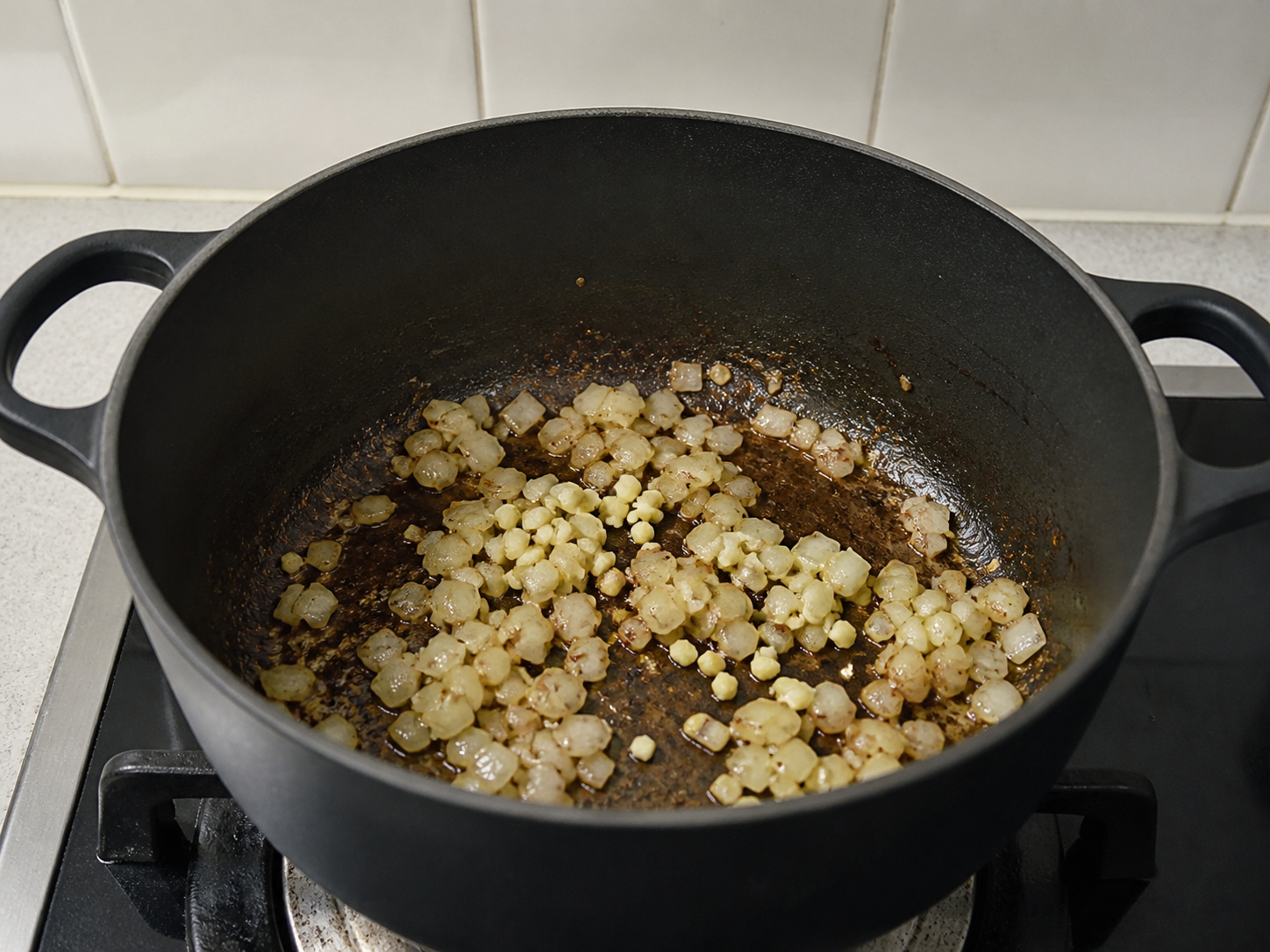 Greek Lamb Meatball and Orzo Soup — Soften onion and garlic