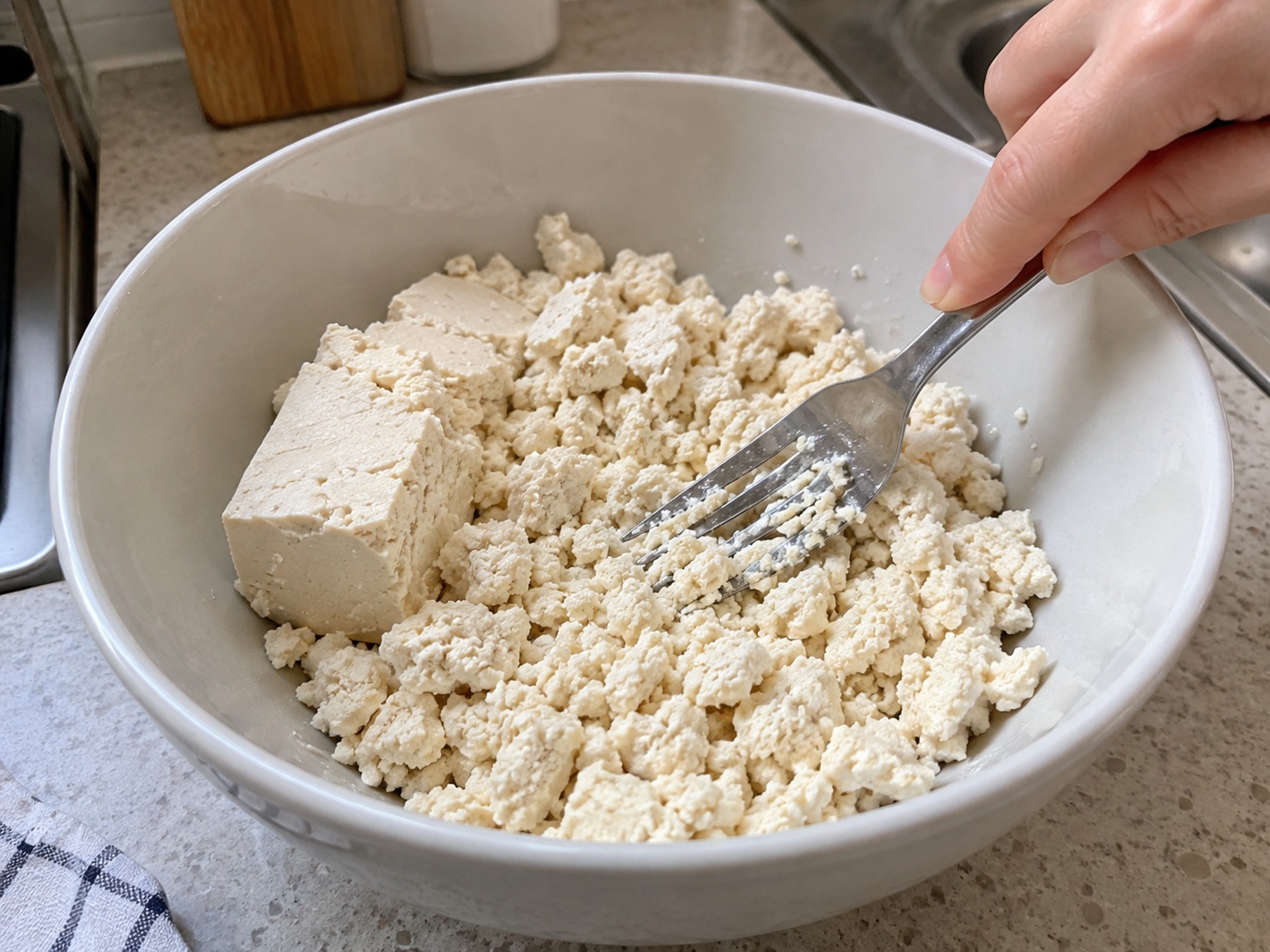 Guangxi Stuffed Tofu Peppers — 3. Break tofu into small crumbs with a fork, leaving no large wet lumps