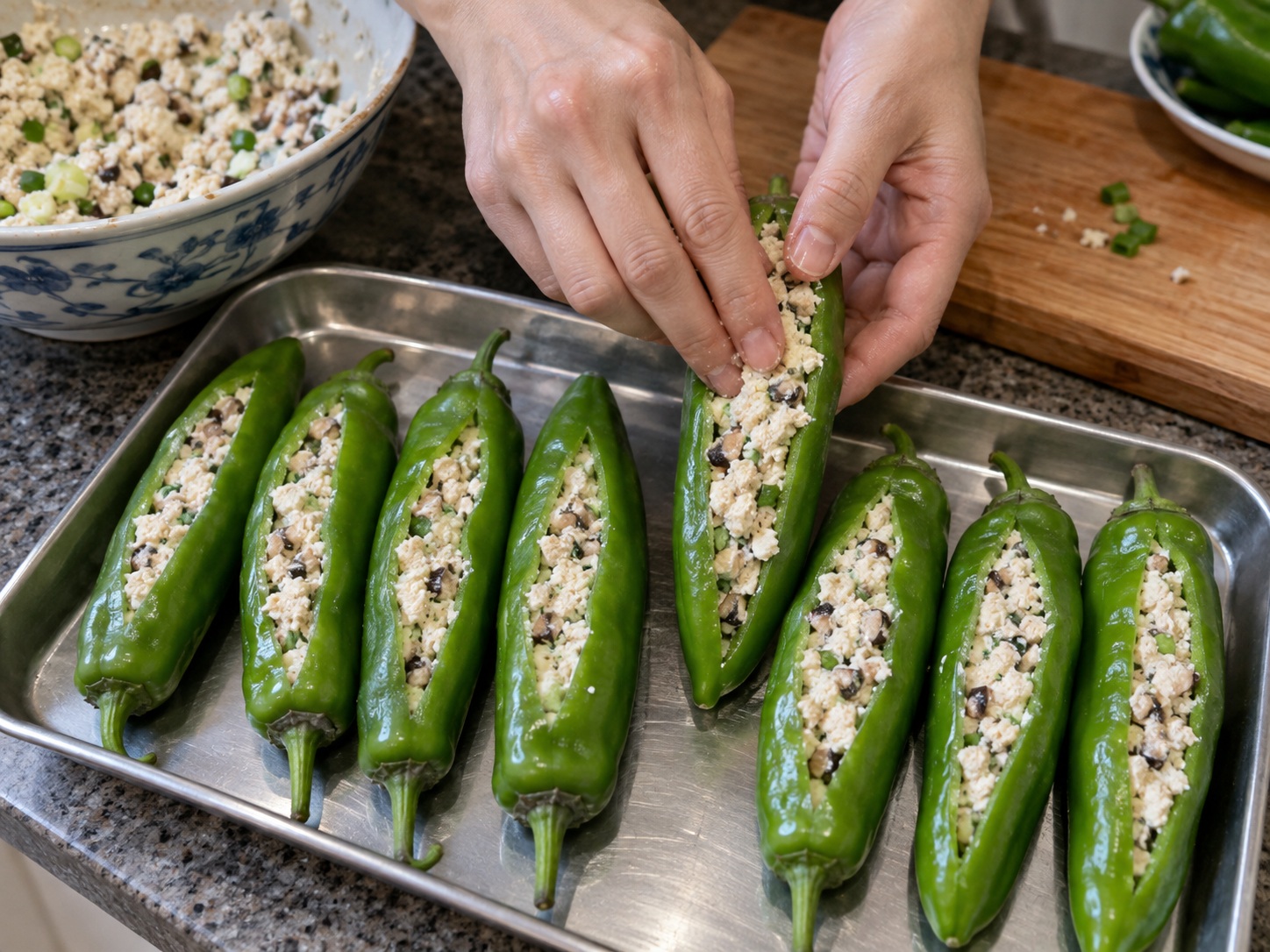Guangxi Stuffed Tofu Peppers — 7. Press filling firmly into each pepper, leveling the opening