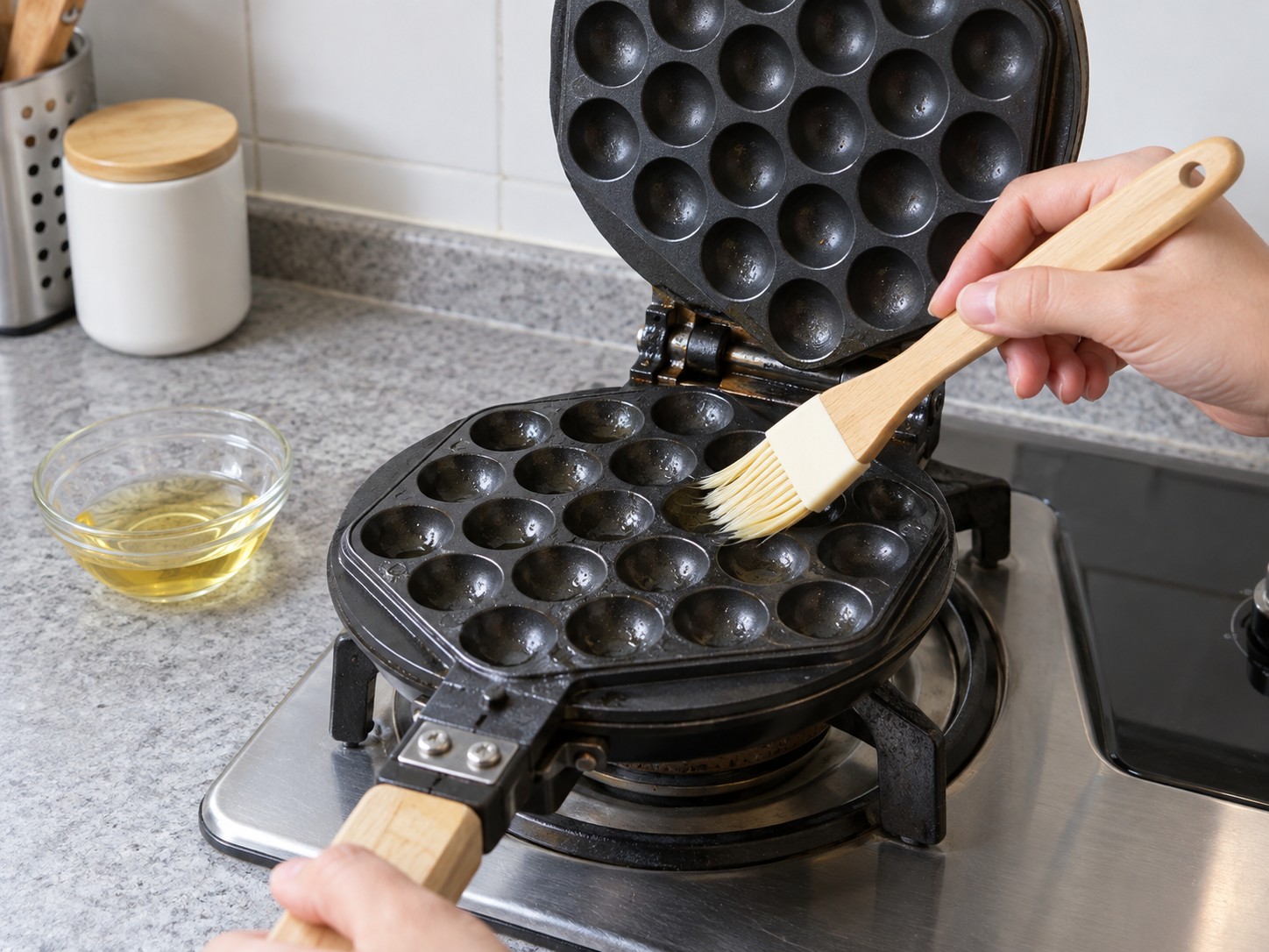 Hong Kong Egg Waffles — 7. Brush the moulds lightly with oil, including the hinge edges.