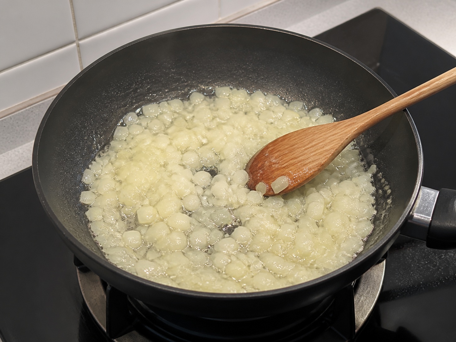 Soften onion in butter: Soften onion in butter. Use the listed ingredients and the appropriate household tool in order; confirm the food has reached the described state before continuing.