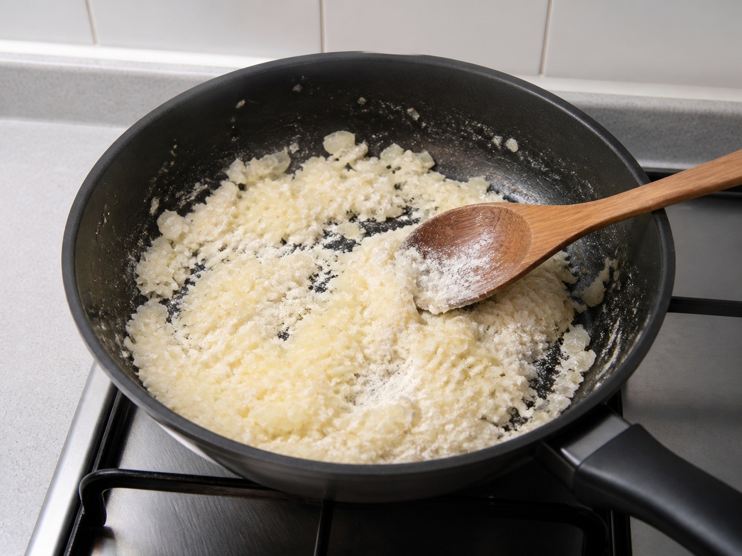 Stir in flour: Stir in flour. Use the listed ingredients and the appropriate household tool in order; confirm the food has reached the described state before continuing.
