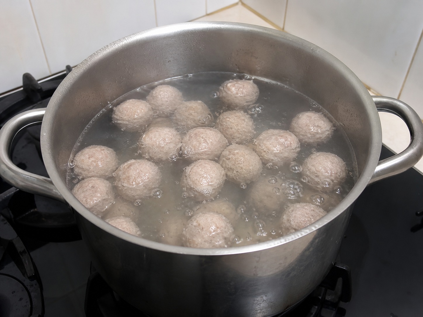 Indonesian Beef Bakso Soup: Poach meatballs