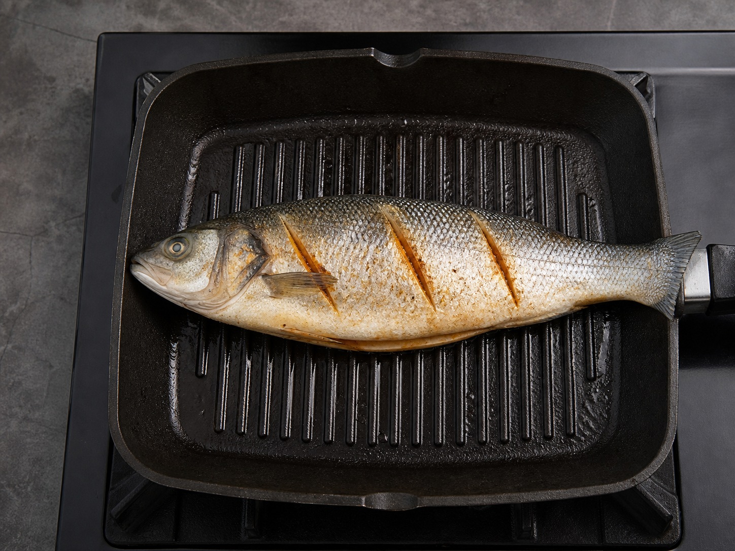 Indonesian Grilled Fish with Sweet Soy Sambal: Grill the first side