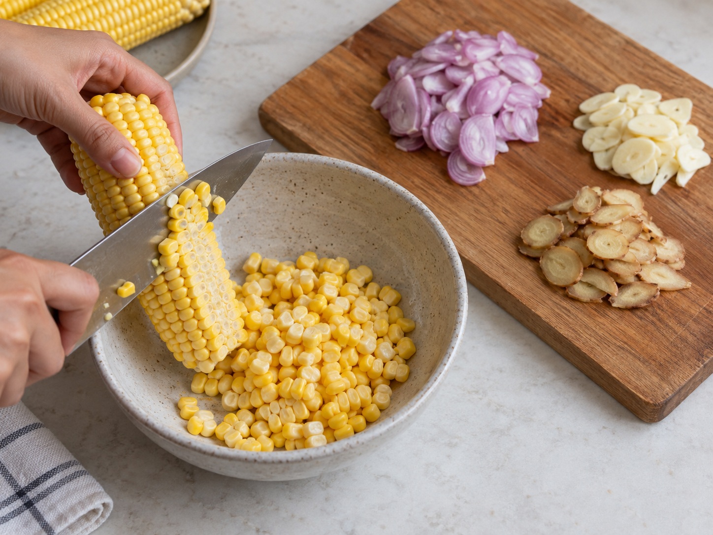 Indonesian Sayur Bening Spinach Corn Soup — Cut corn and aromatics