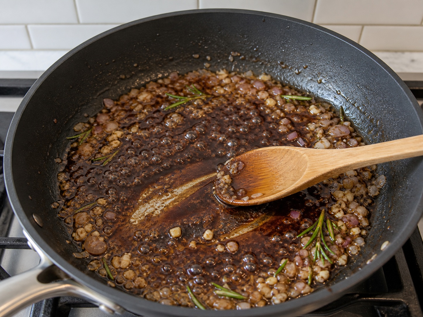 Italian Balsamic Chicken with Grapes and Rosemary — Deglaze with balsamic: Pour in balsamic vinegar, scrape the pan and cook for 1 minute.
