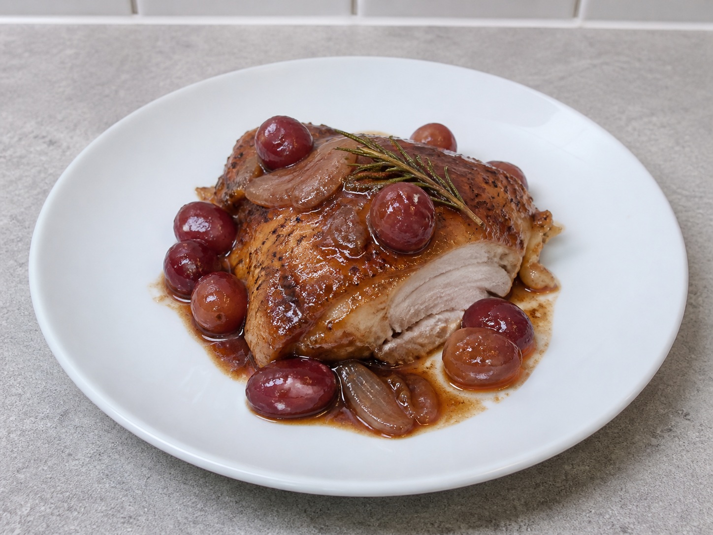 Italian Balsamic Chicken with Grapes and Rosemary — Reduce and serve: Uncover and reduce 2 minutes until glossy, then serve with intact grapes.