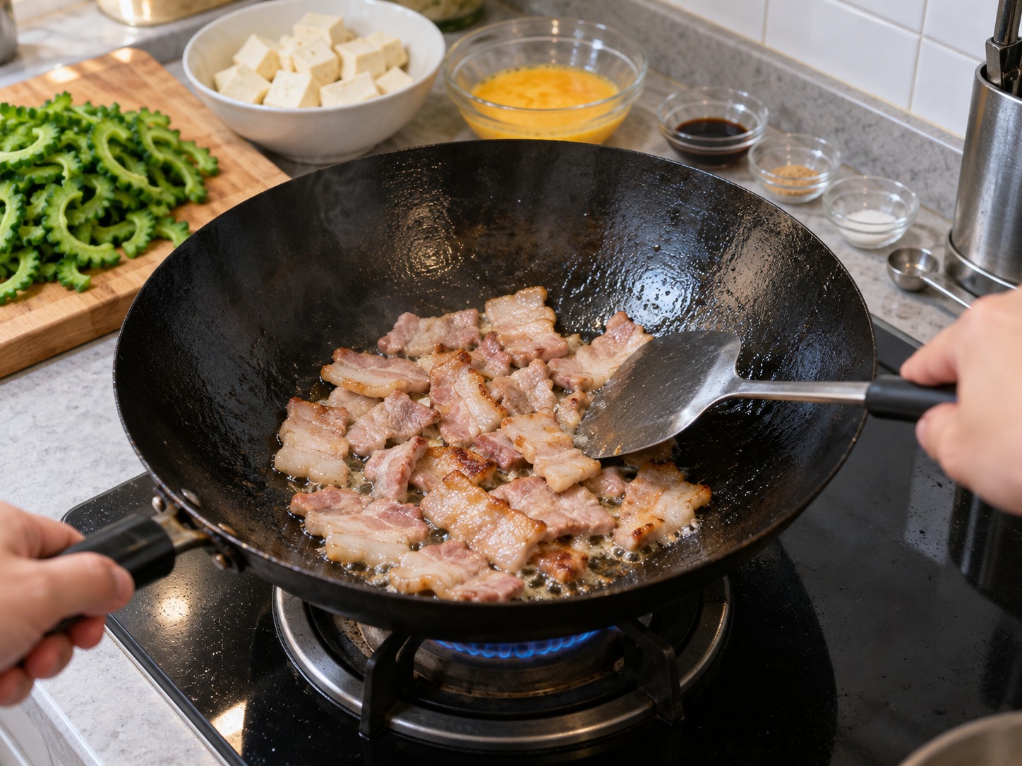 沖繩苦瓜豆腐豬肉炒蛋 — 原鑊炒豬腩至出油和邊緣焦香