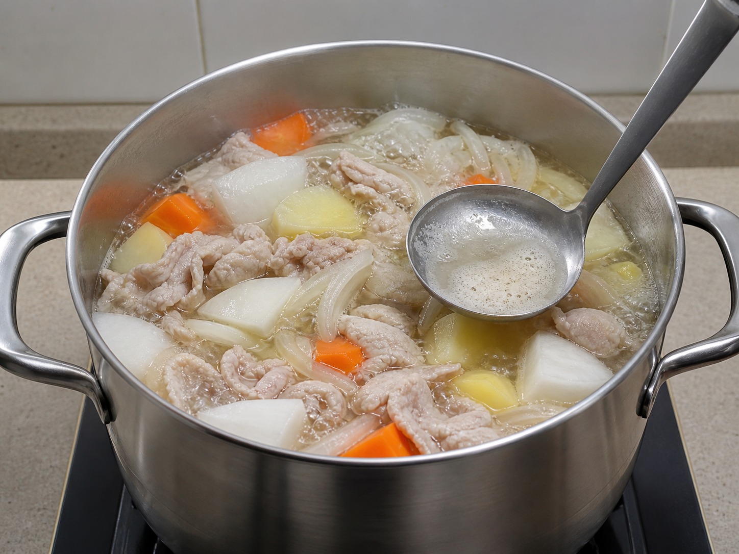 Japanese Pork and Vegetable Miso Soup — Boil and skim