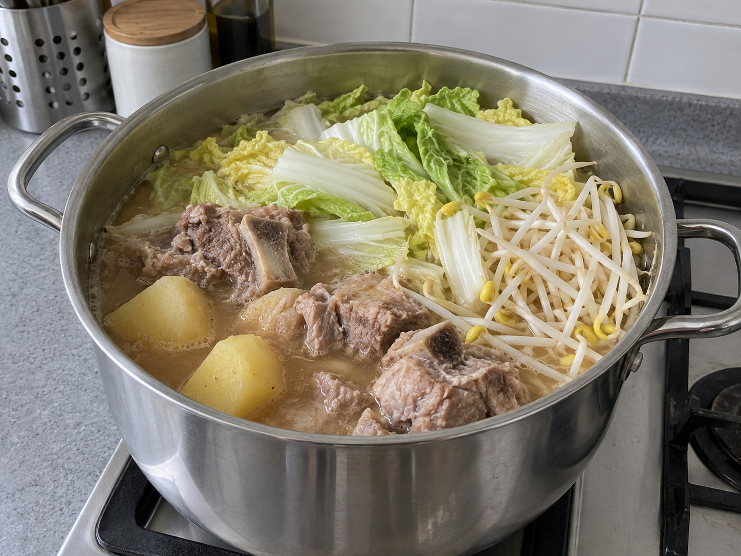 Korean Gamjatang Pork Bone Soup — Add cabbage and sprouts; cook ten minutes