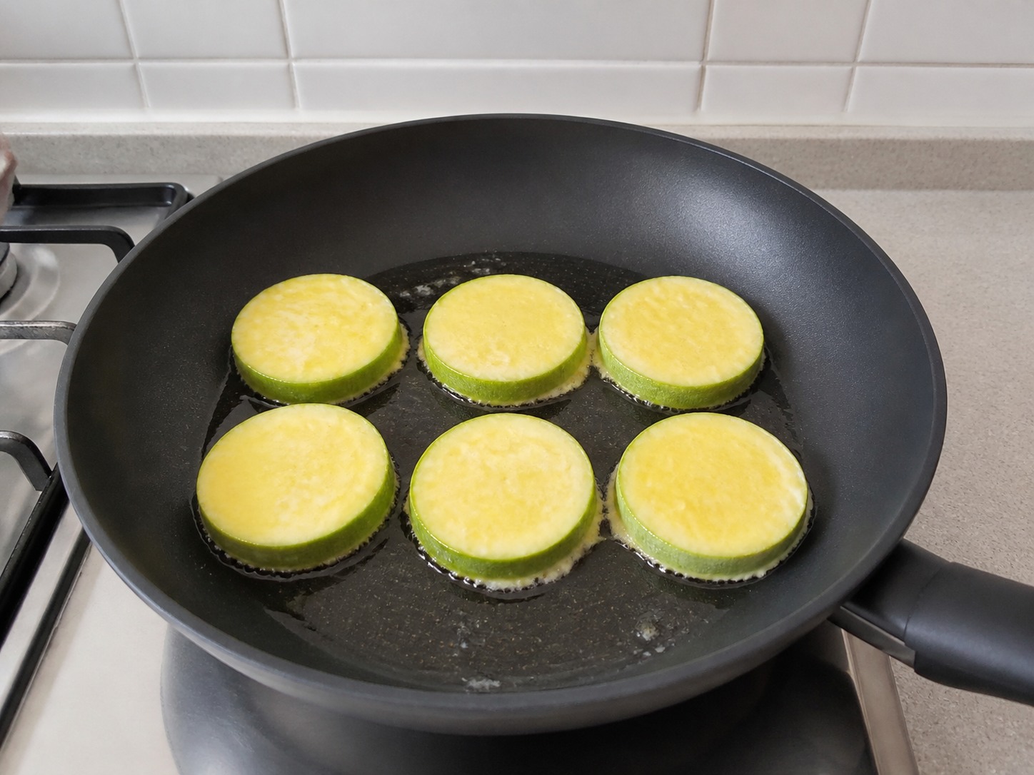 Korean Hobak Jeon Zucchini Pancakes: Fry the first side