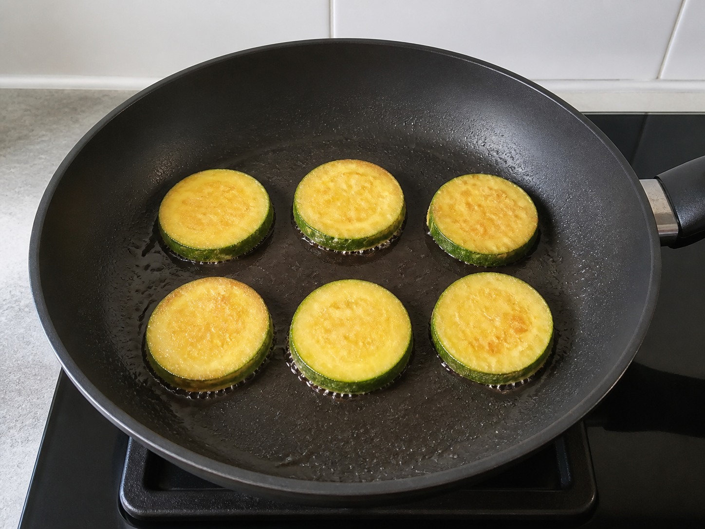 Korean Hobak Jeon Zucchini Pancakes: Flip until golden