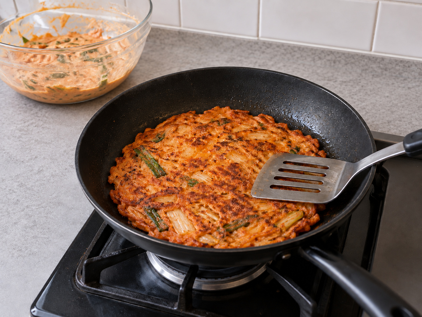 Korean Kimchi Jeon — Turn, press flat and fry 3 to 4 minutes more