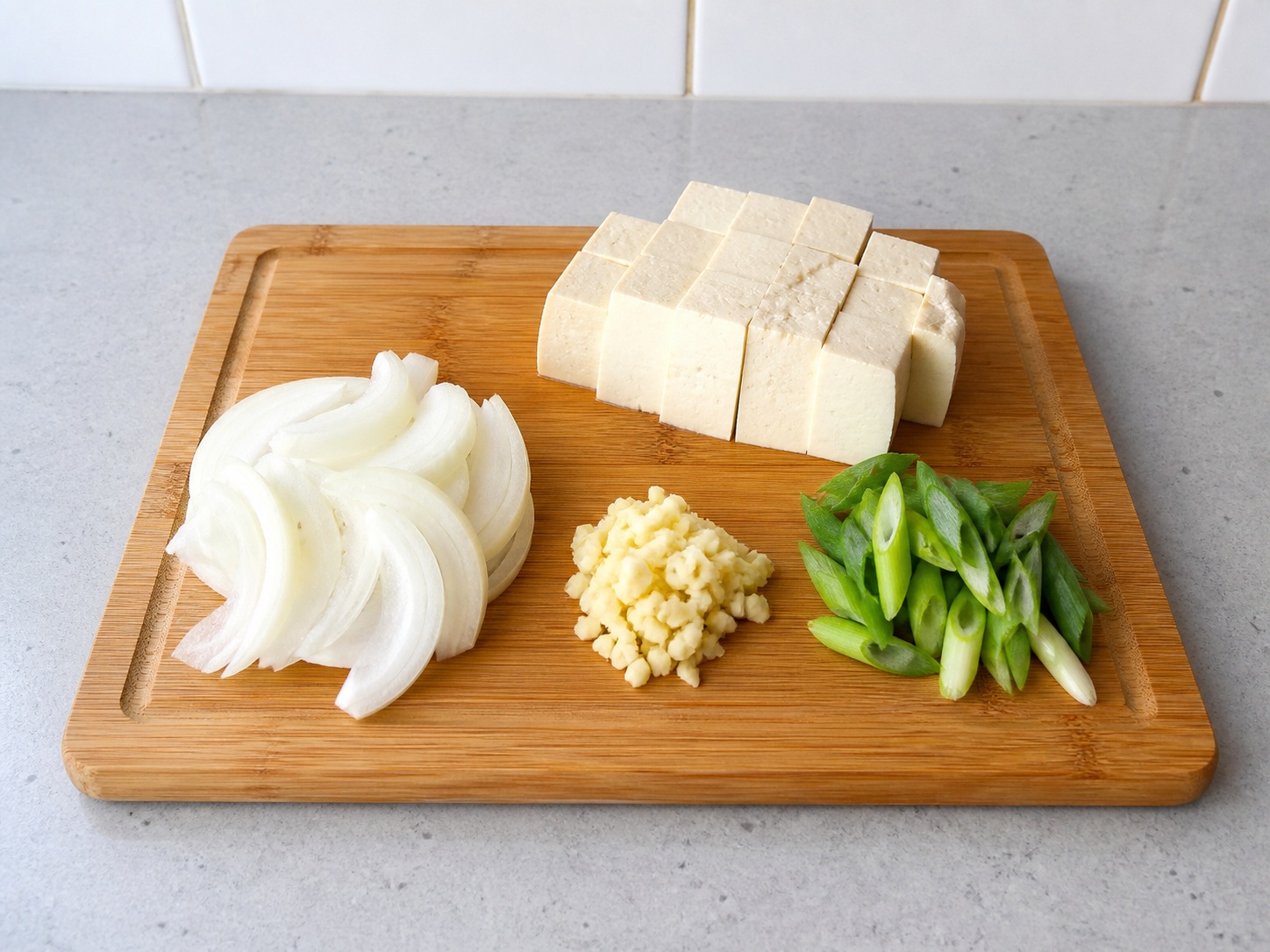 Korean Kimchi Stew with Pork and Tofu — Prepare tofu and aromatics