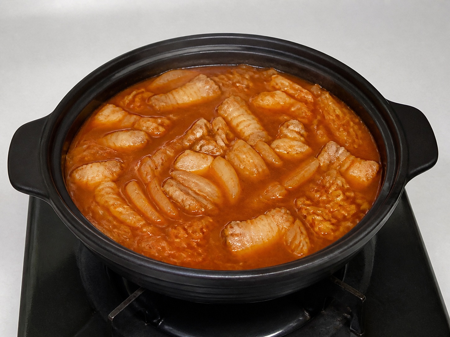 Korean Kimchi Stew with Pork and Tofu — Add liquids