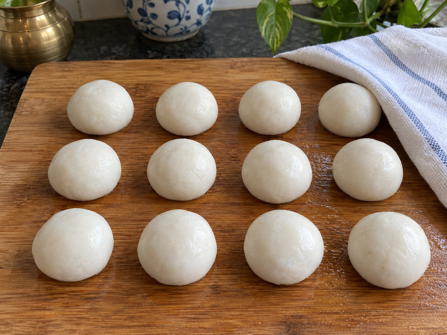 Nepali Yomari — Divide the dough into twelve pieces and cover with a damp cloth