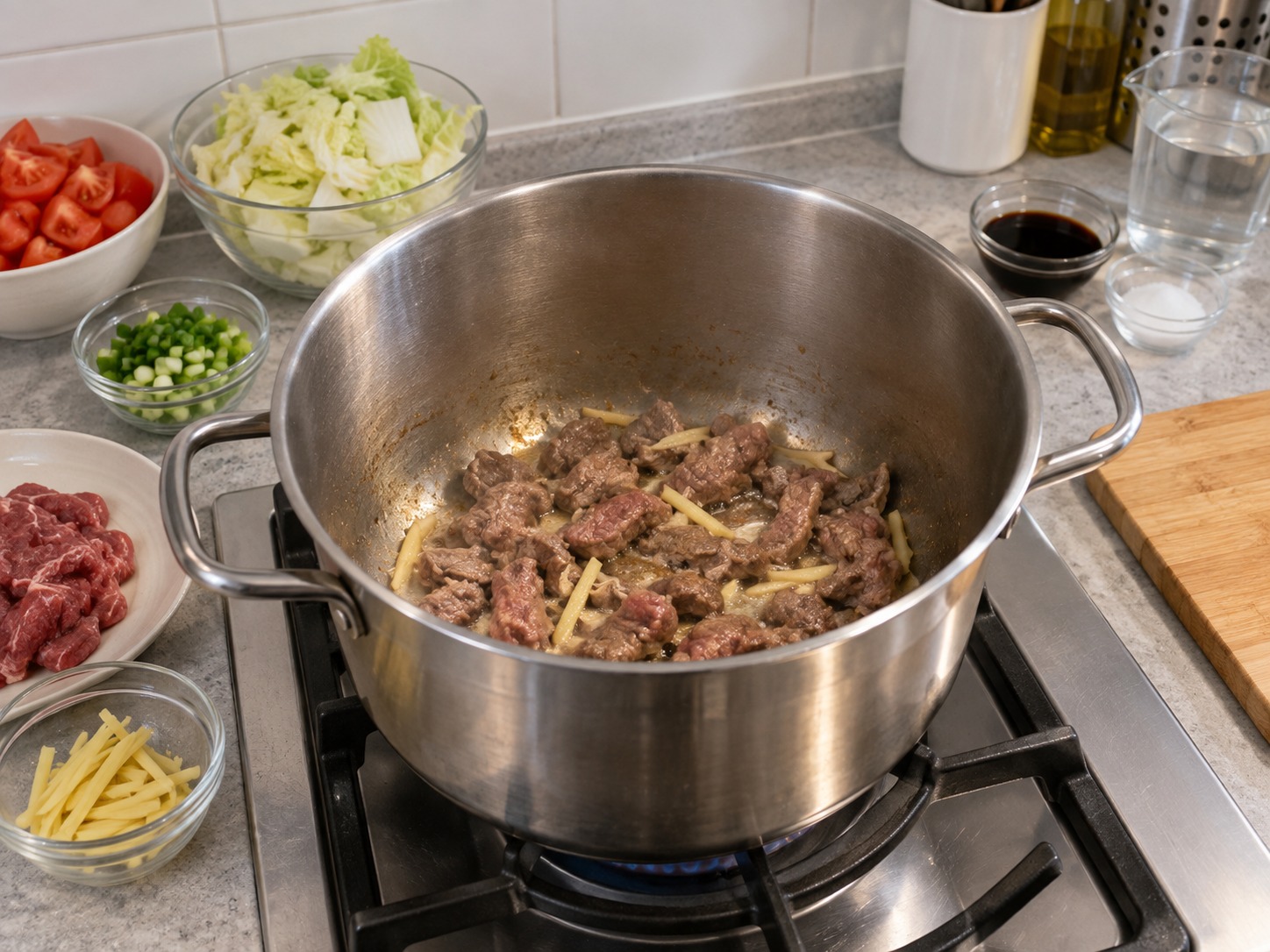 Shanxi Knife-cut Noodles — Fry the beef and ginger in a stockpot until fragrant