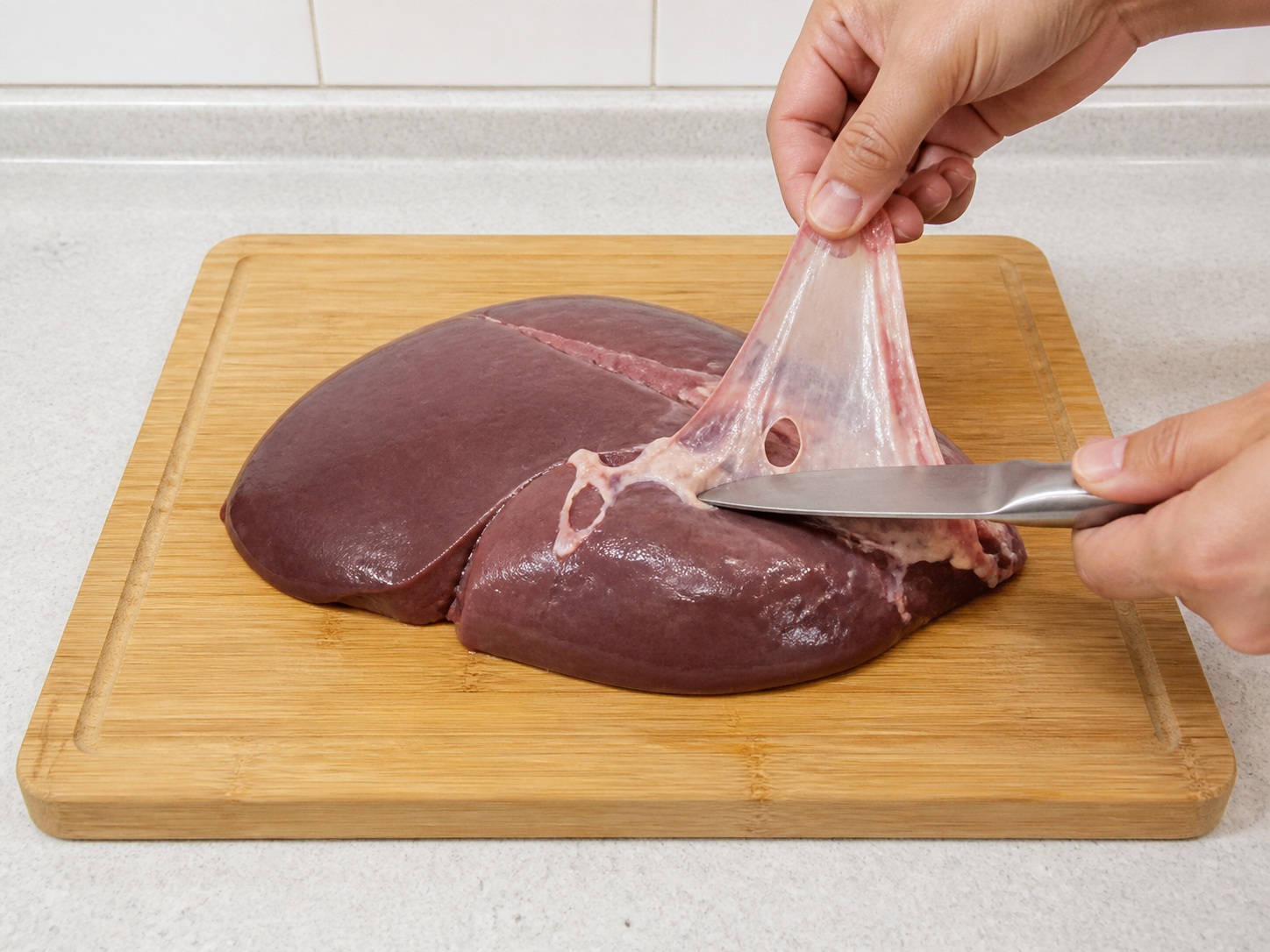 Spinach and Pork Liver Soup — Trim the pork liver