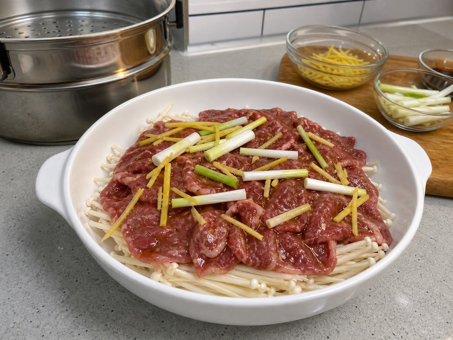 Steamed Beef with Enoki Mushrooms — Spread beef over the enoki