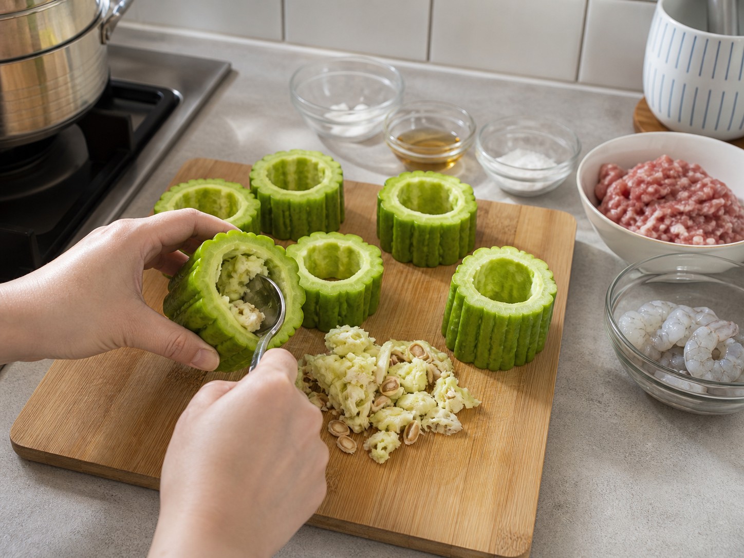 Steamed Stuffed Bitter Melon with Pork and Shrimp — Cut and hollow the bitter melon