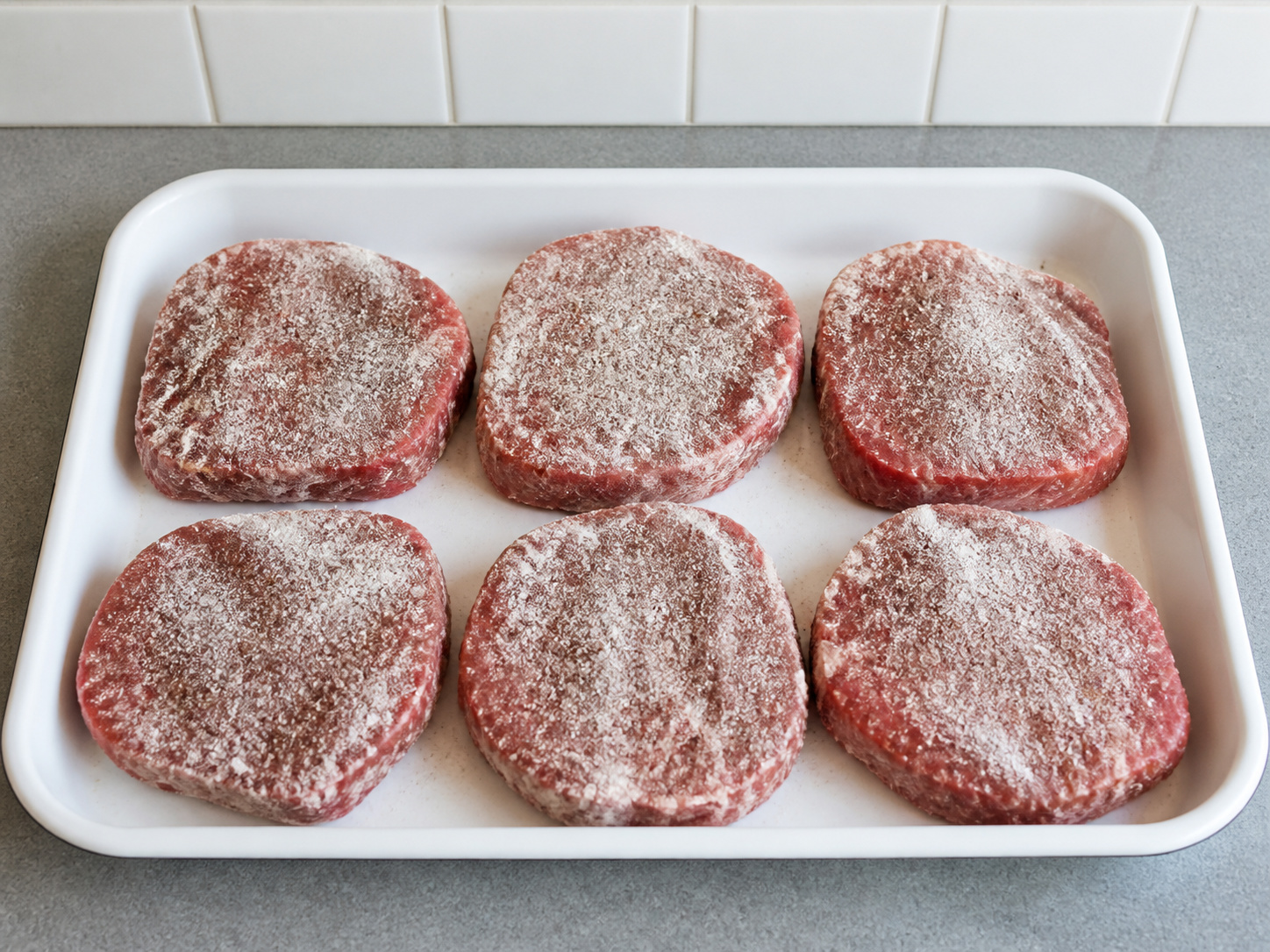 Swiss Steak with Tomato and Onions — Season and flour