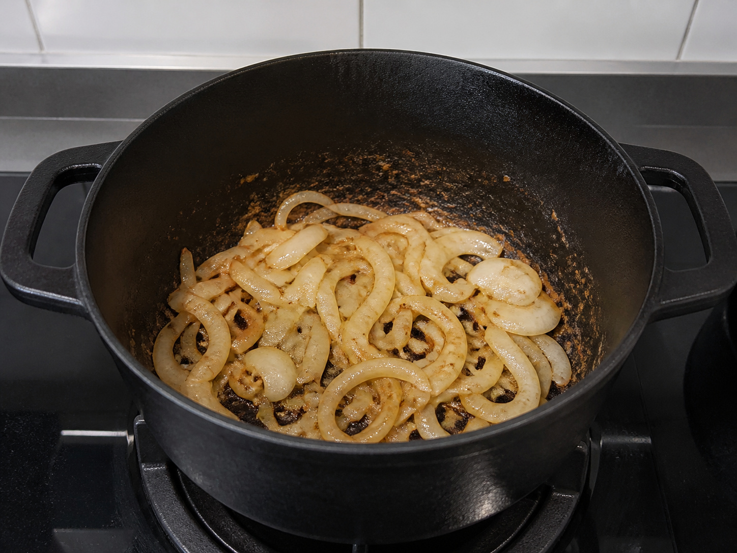 Swiss Steak with Tomato and Onions — Soften onions