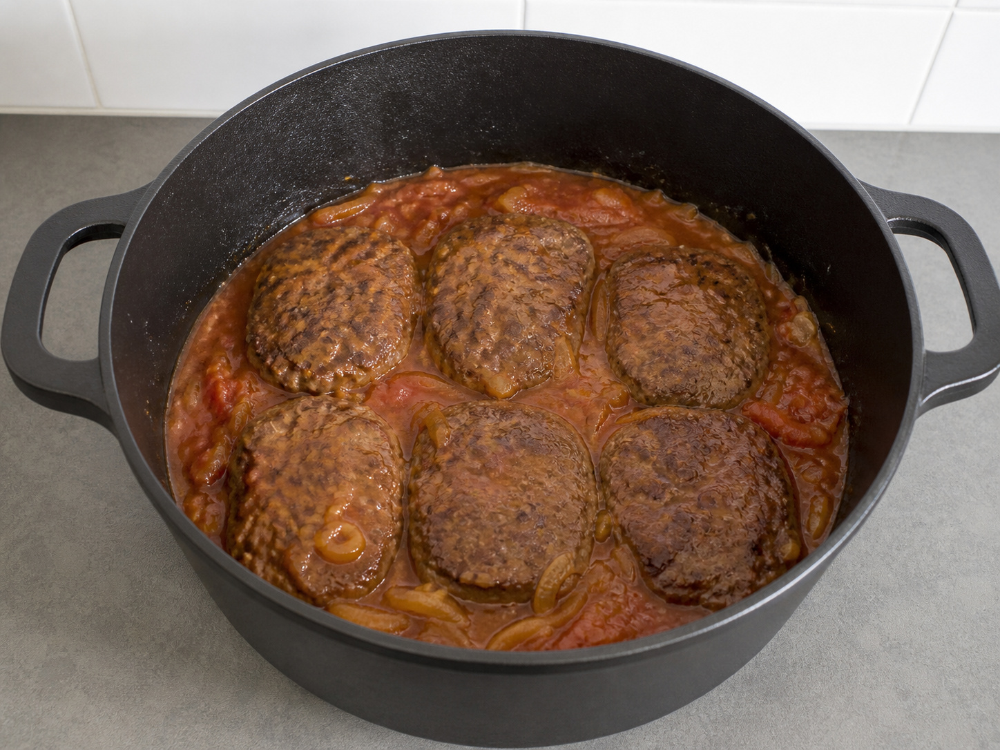 Swiss Steak with Tomato and Onions — Return steaks