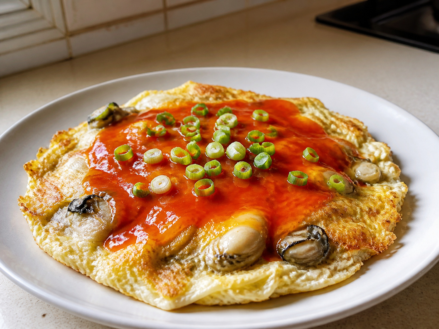 Taiwanes na Tortang Talaba: Ang talaba, malinaw na halo ng gawgaw na patatas, repolyo at itlog ay nagiging makunat na tortang malutong ang gilid at may mainit na matamis na sarsa.