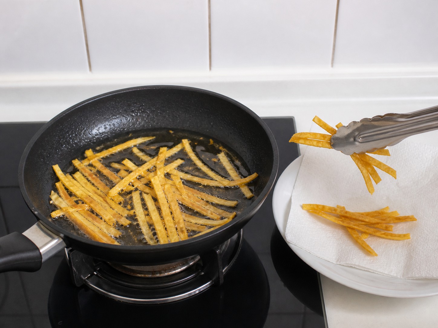 Tex-Mex Chicken Tortilla Soup — Crisp the tortilla strips and drain