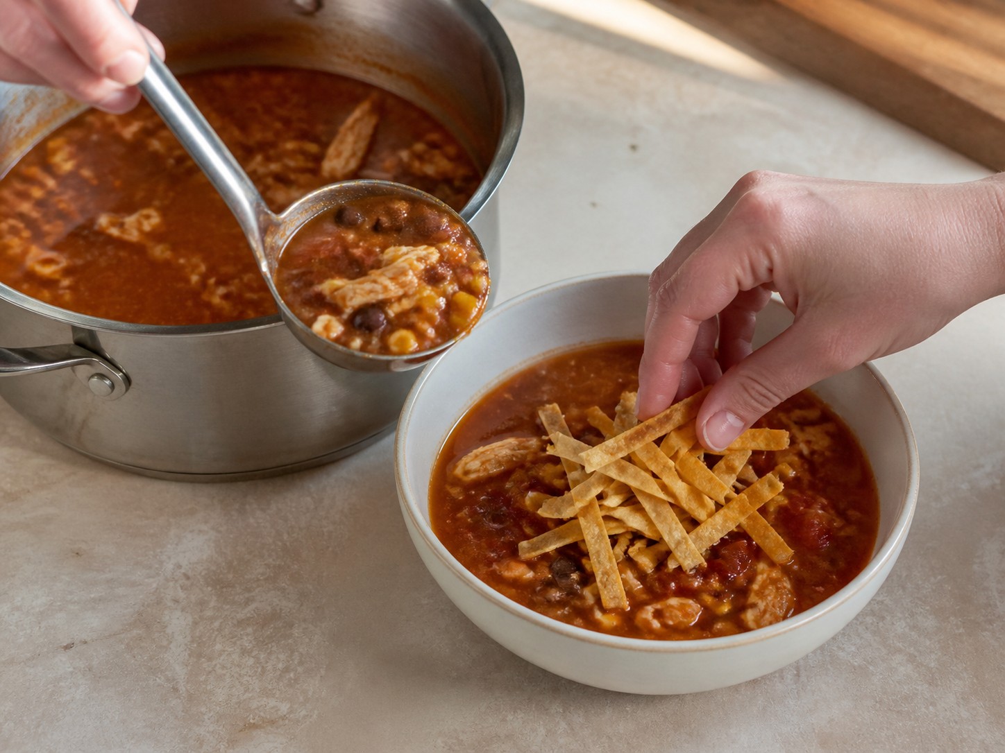 Tex-Mex Chicken Tortilla Soup — Ladle into bowls and top with crisp tortilla strips
